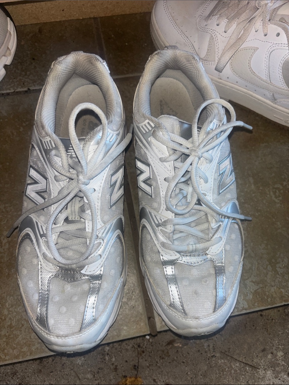 New Balance Kids White Athletic Sneakers with Silver Accents